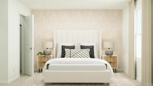 a bedroom with a bed and a window