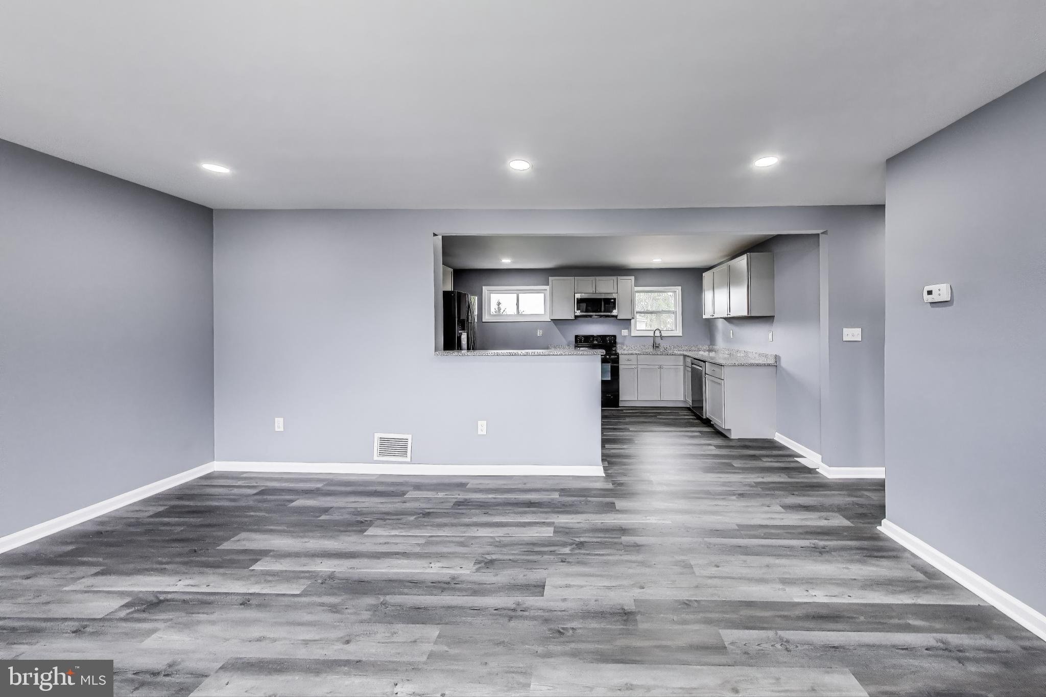 2500 Gehb Avenue Baltimore, MD 21227 - Photo 12 of 53 a view of kitchen with wooden cabinet and stainless steel appliances