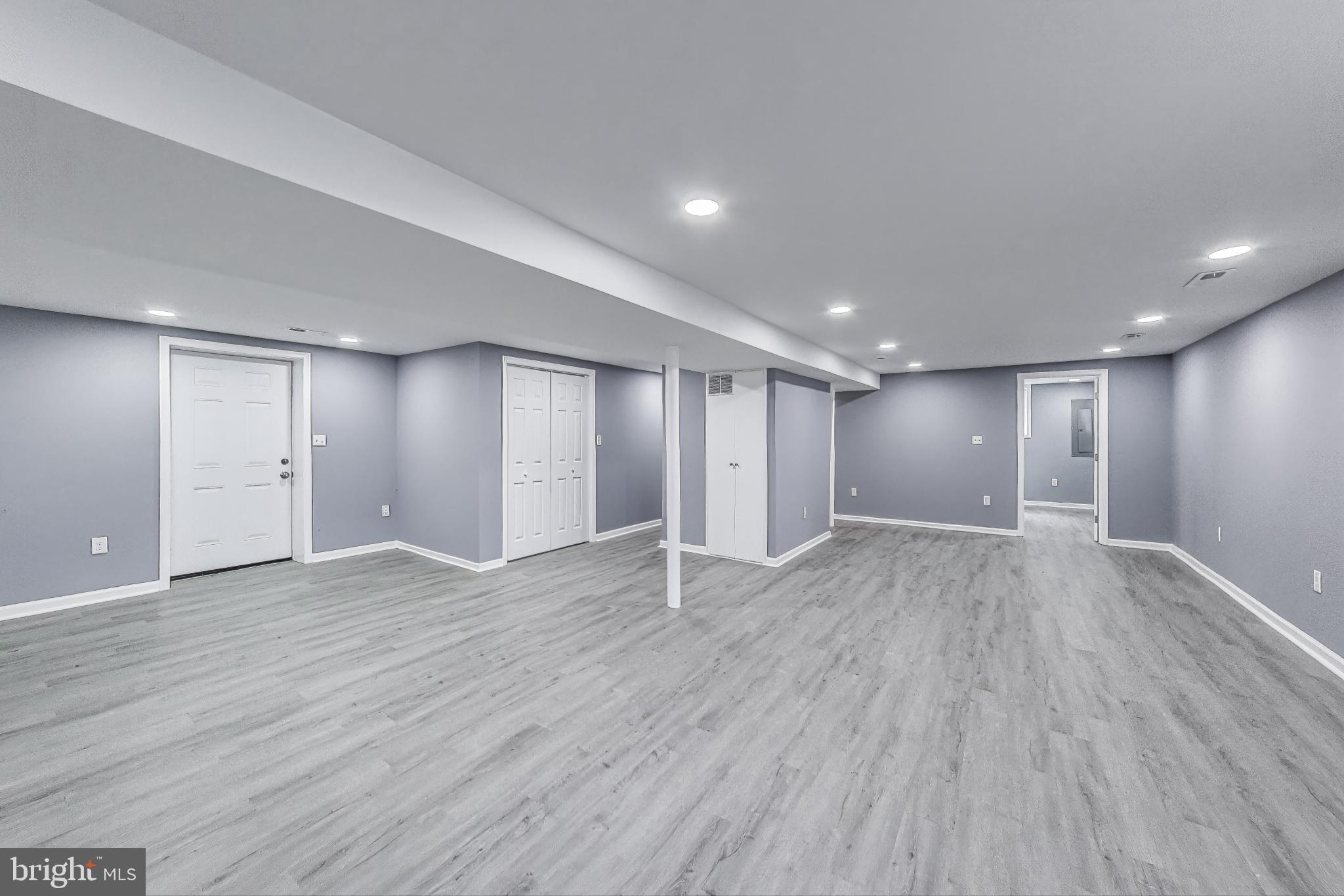 2500 Gehb Avenue Baltimore, MD 21227 - Photo 32 of 53 a view of an empty room with wooden floor