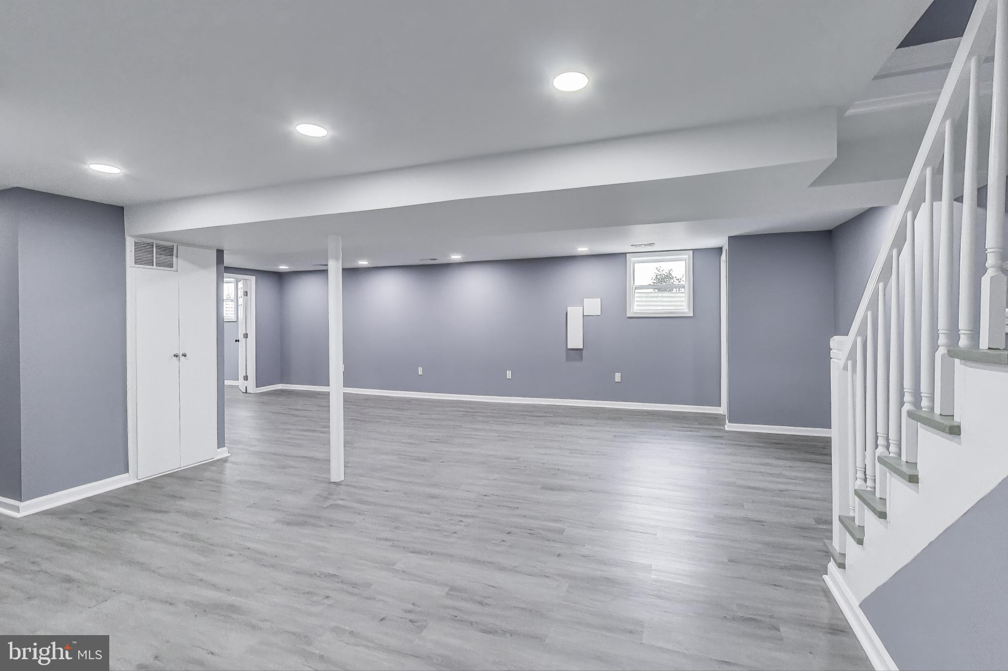 2500 Gehb Avenue Baltimore, MD 21227 - Photo 33 of 53 an empty room with wooden floor and windows