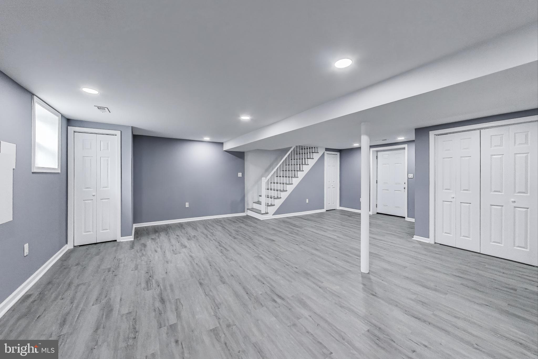 2500 Gehb Avenue Baltimore, MD 21227 - Photo 34 of 53 a view of an empty room with wooden floor