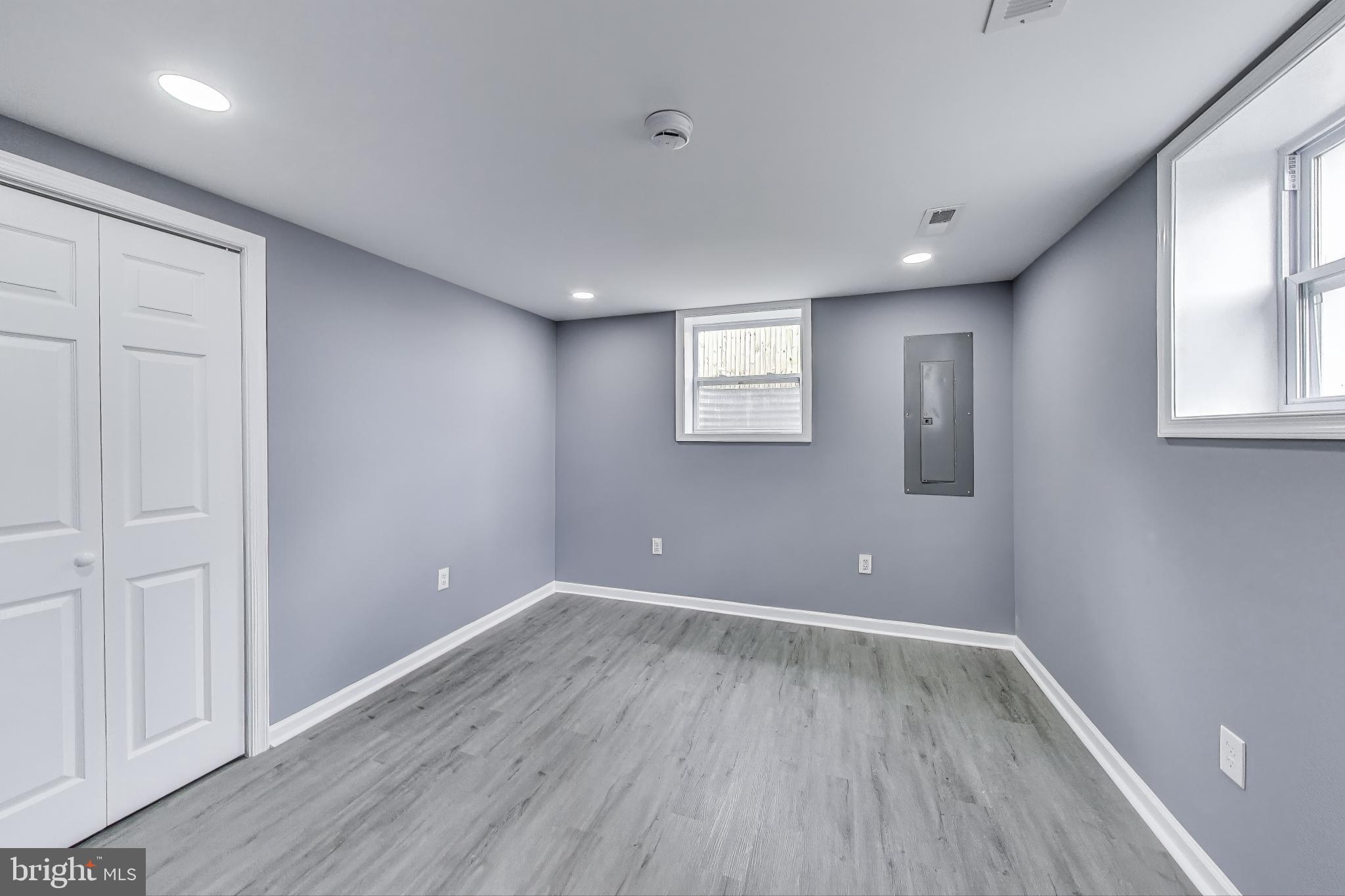 2500 Gehb Avenue Baltimore, MD 21227 - Photo 35 of 53 a view of empty room with wooden floor and fan