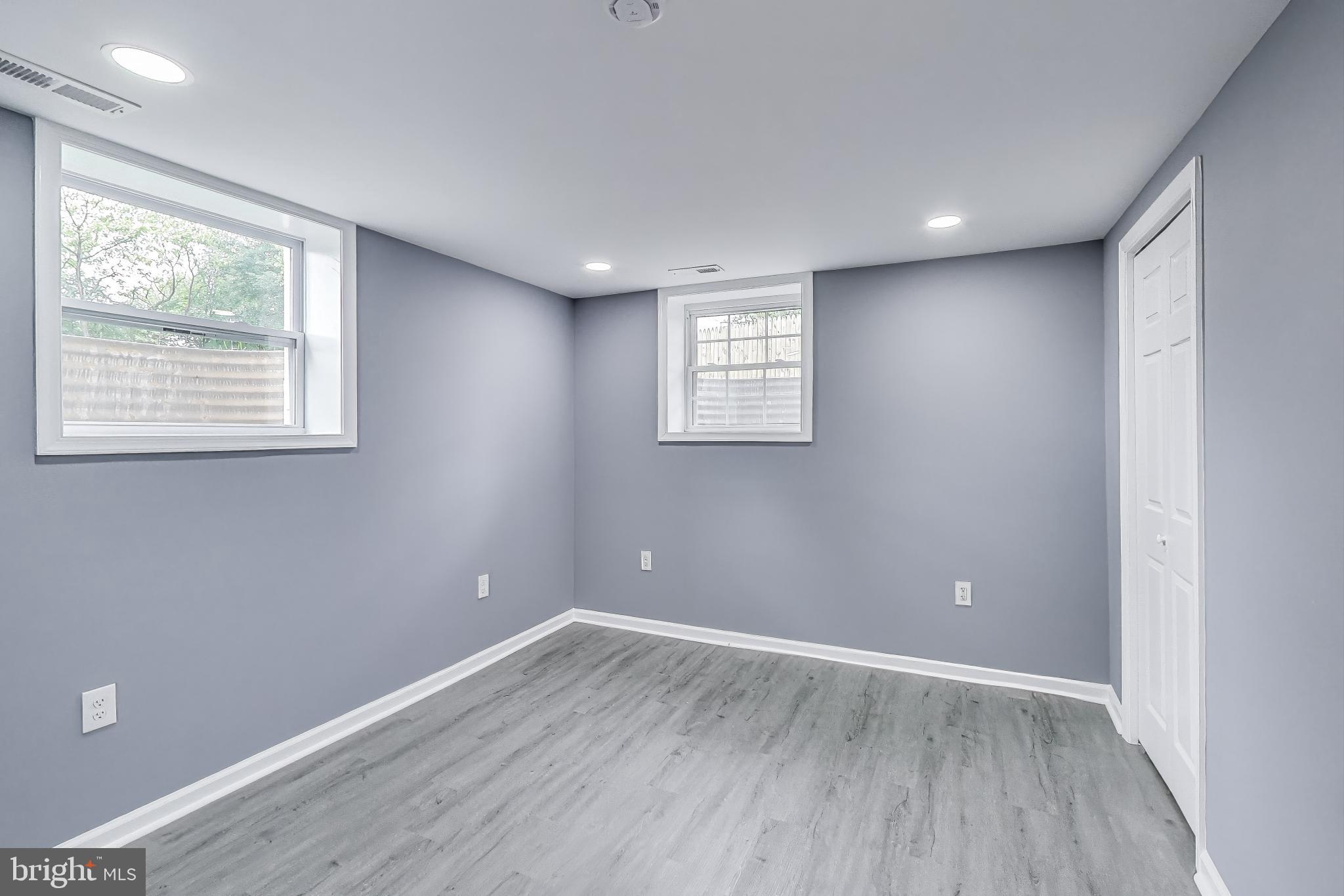 2500 Gehb Avenue Baltimore, MD 21227 - Photo 38 of 53 an empty room with wooden floor and windows