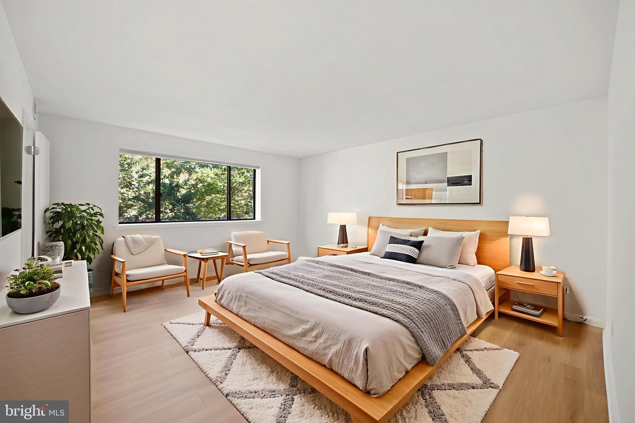 1656 Parkcrest Circle, Unit 2D/301 Reston, VA 20190 - Photo 16 of 29 a bedroom with a bed and a large window