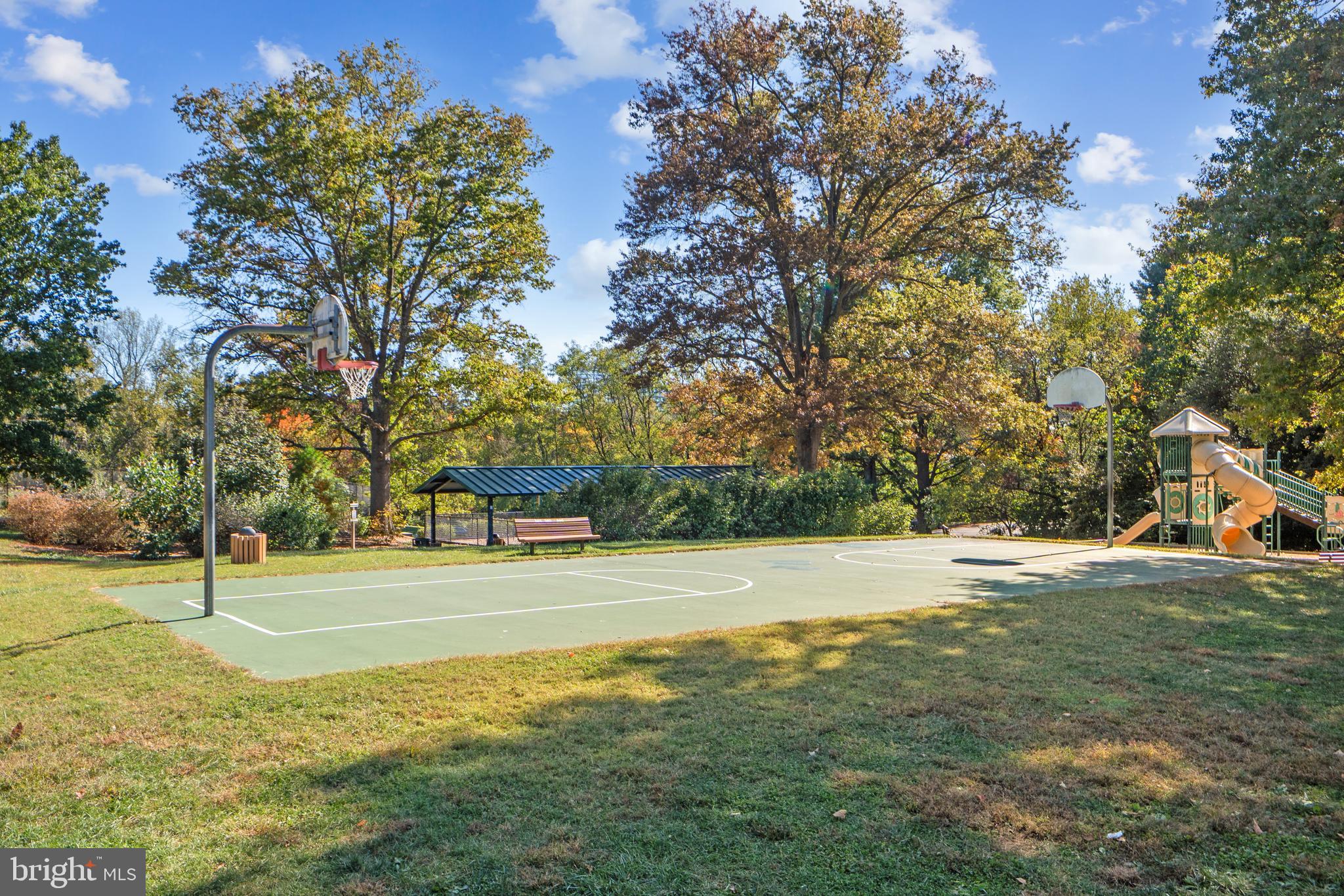 1656 Parkcrest Circle, Unit 2D/301 Reston, VA 20190 - Photo 23 of 29 a view of a playground with basketball court