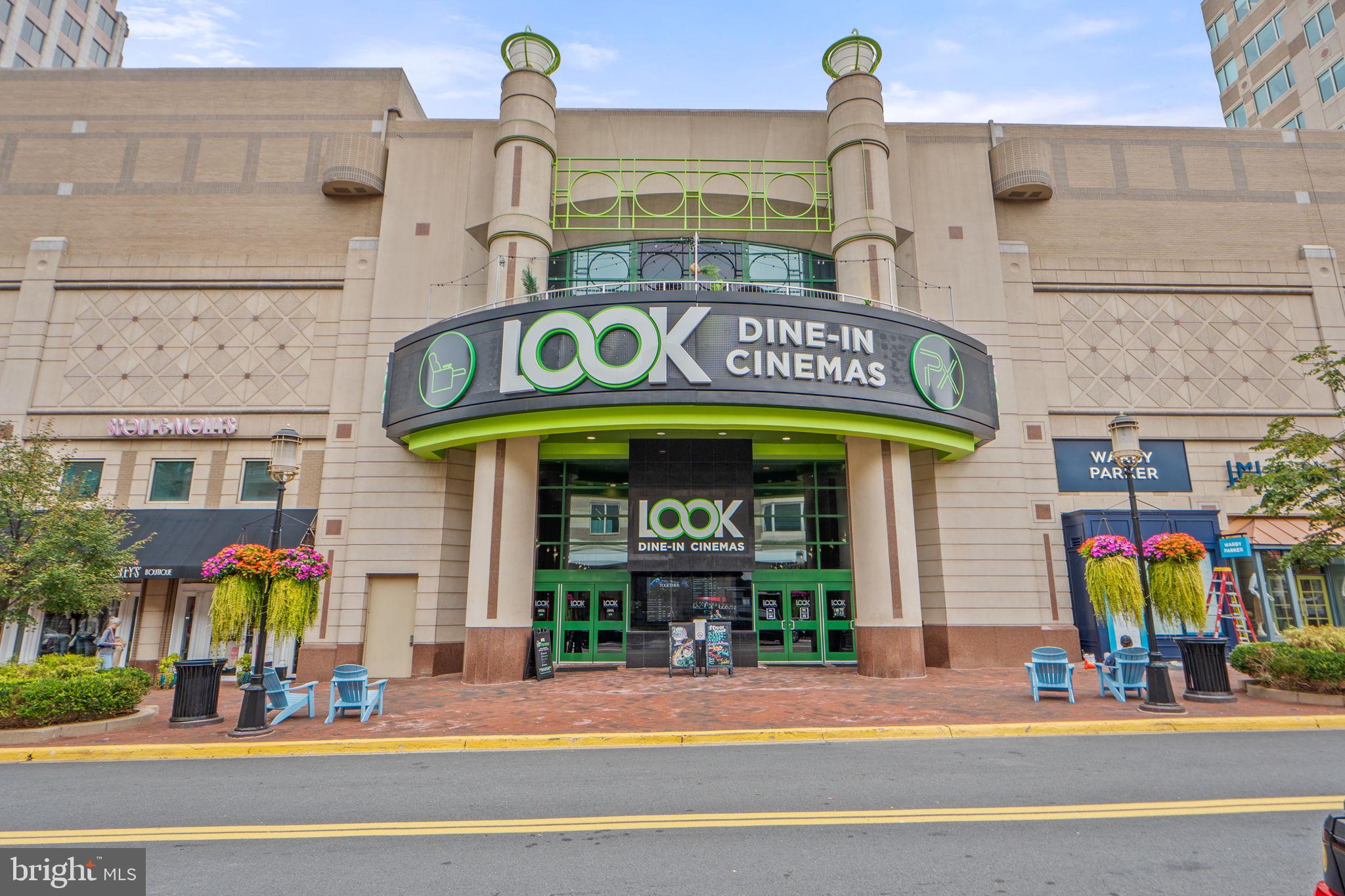1656 Parkcrest Circle, Unit 2D/301 Reston, VA 20190 - Photo 26 of 29 a front view of multi story building with retail shops