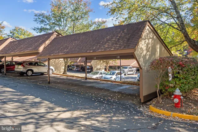 a view of street with parked cars