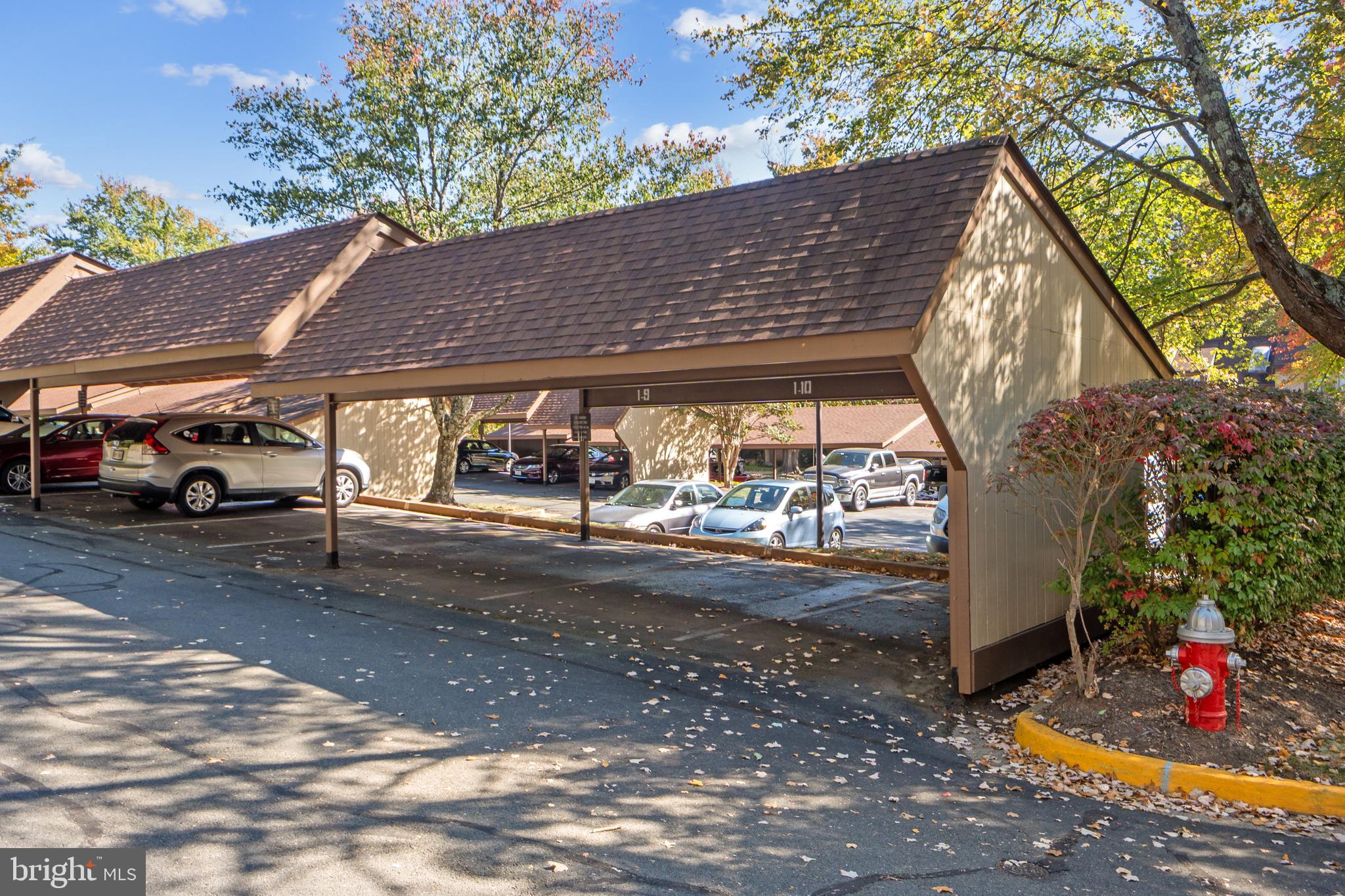 1656 Parkcrest Circle, Unit 2D/301 Reston, VA 20190 - Photo 3 of 29 a view of street with parked cars