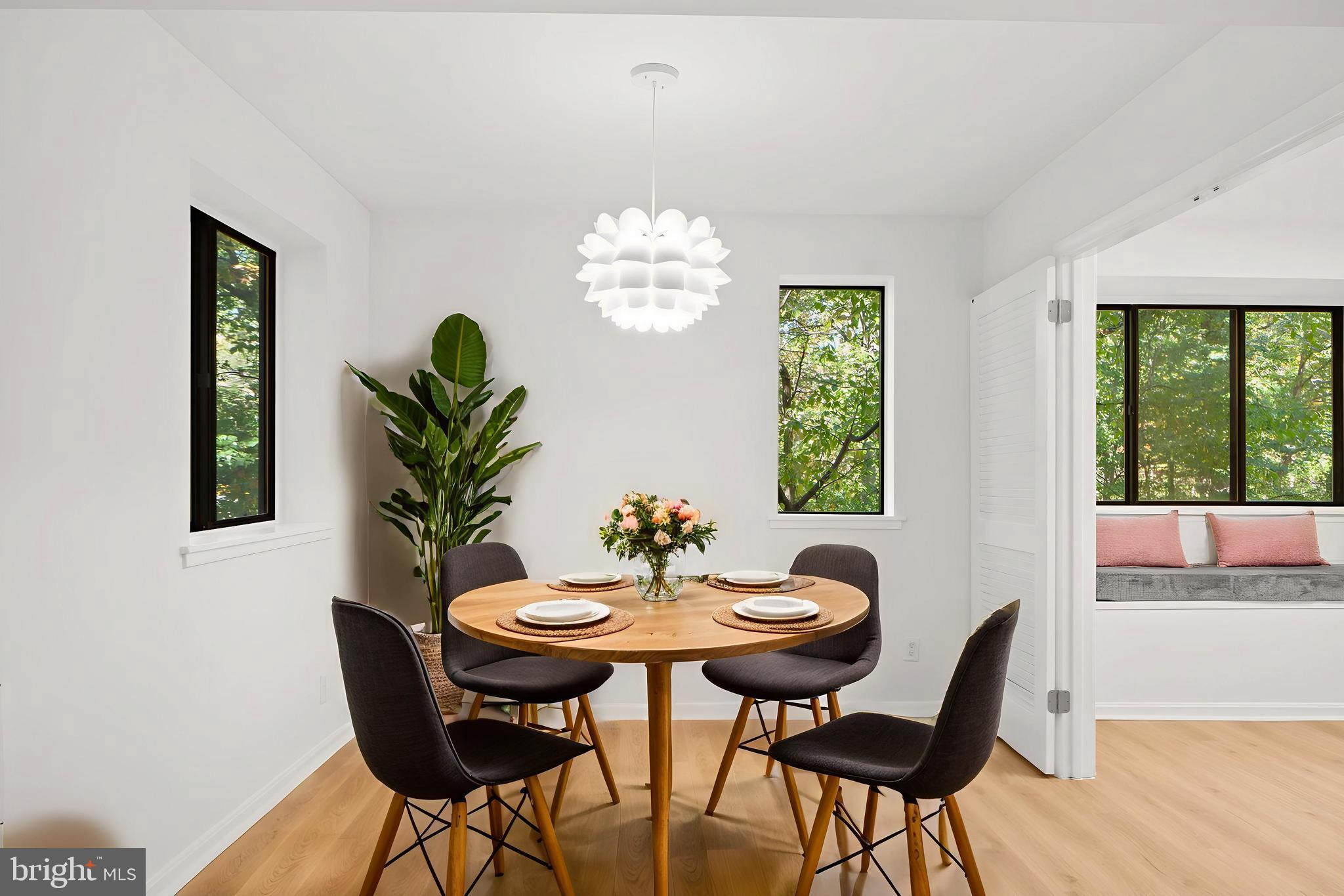 1656 Parkcrest Circle, Unit 2D/301 Reston, VA 20190 - Photo 9 of 29 a view of a dining room with furniture window and outside view