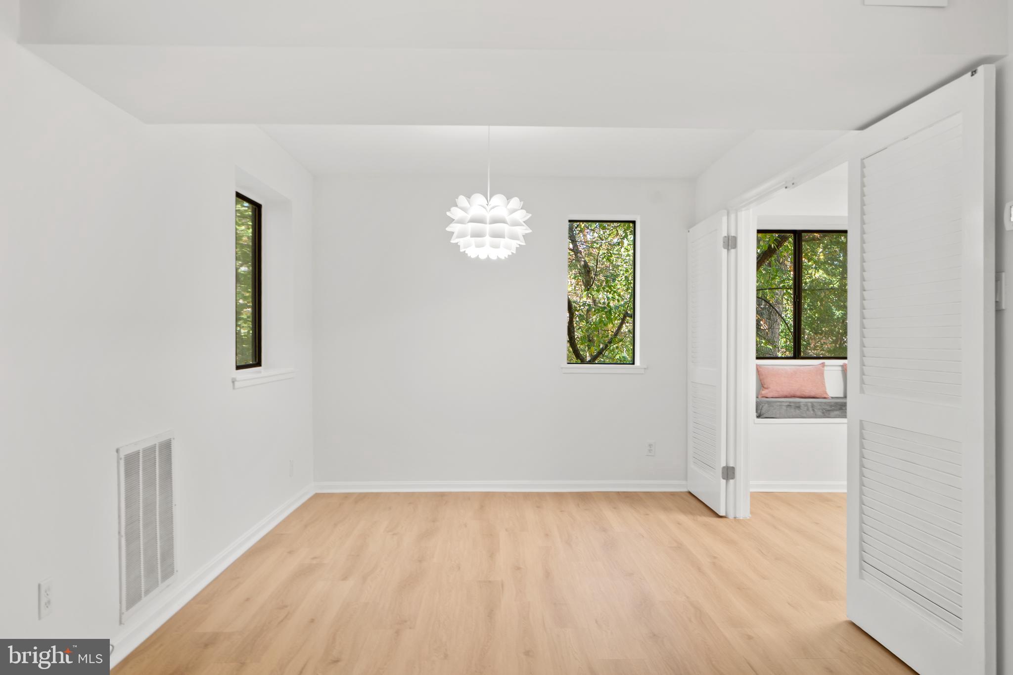 1656 Parkcrest Circle, Unit 2D/301 Reston, VA 20190 - Photo 10 of 29 an empty room with windows and closet