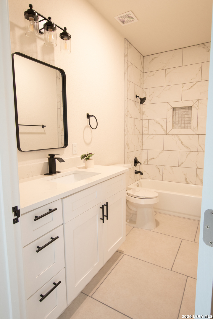2962 Contour Drive Spring Branch, TX 78070 - Photo 24 of 34 a bathroom with a double vanity sink mirror and shower