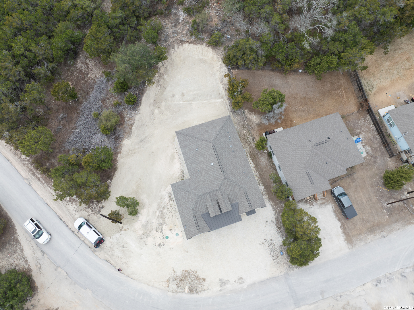2962 Contour Drive Spring Branch, TX 78070 - Photo 32 of 34 an aerial view of a house with a yard