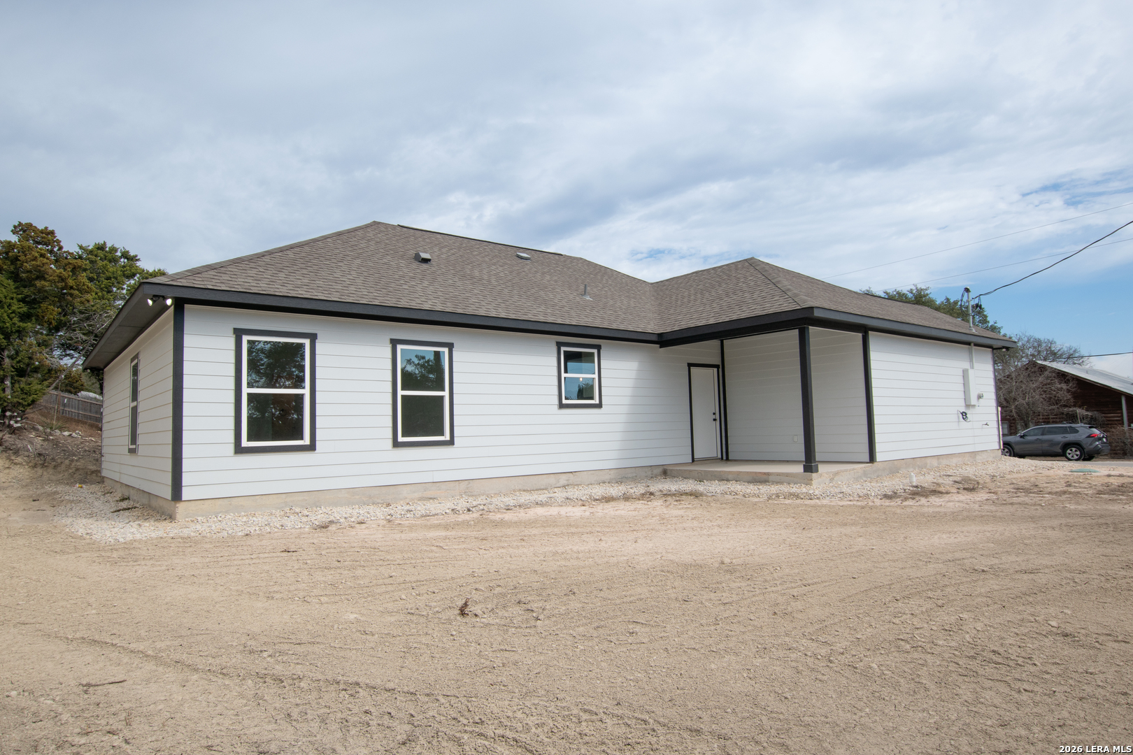 2962 Contour Drive Spring Branch, TX 78070 - Photo 4 of 34 a house with yard in front of it