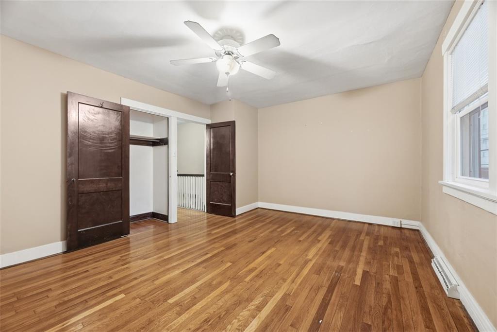 436 44th Street Pittsburgh, PA 15201 - Photo 17 of 30 wooden floor in an empty room with a window