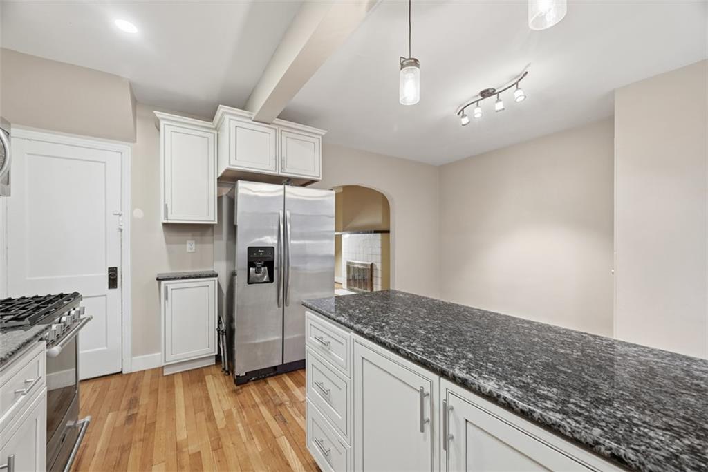 436 44th Street Pittsburgh, PA 15201 - Photo 9 of 30 a kitchen with refrigerator and window