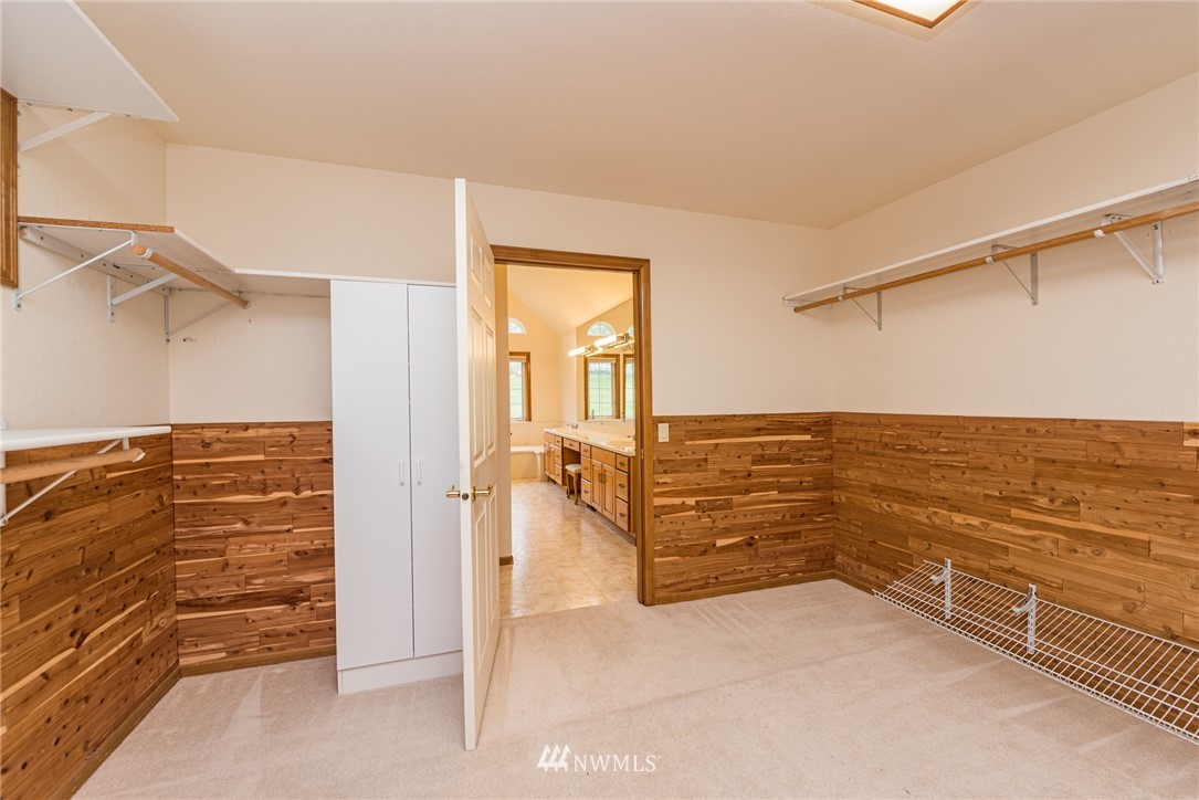 2367 Happy Valley Road Sequim, WA 98382 - Photo 22 of 39 a view of walk in closet with clothes