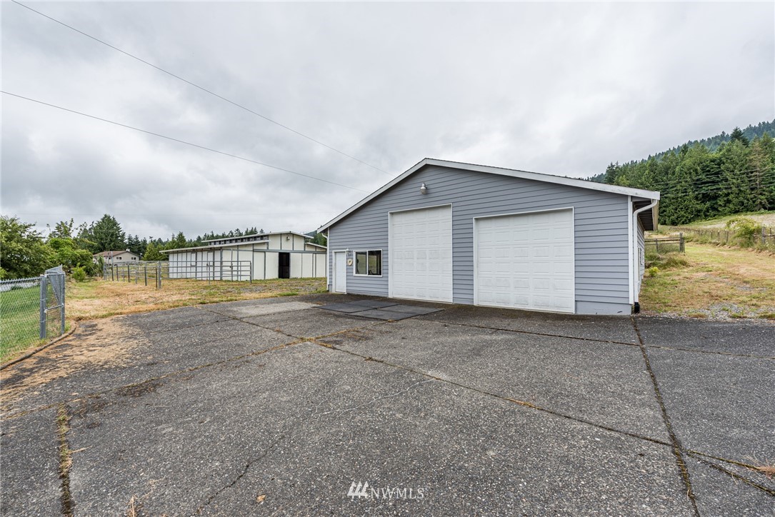 2367 Happy Valley Road Sequim, WA 98382 - Photo 29 of 39 a view of a house with a yard and lake view