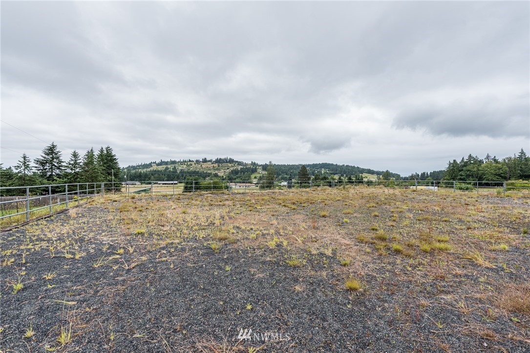 2367 Happy Valley Road Sequim, WA 98382 - Photo 36 of 39 a view of a lake with houses in the back