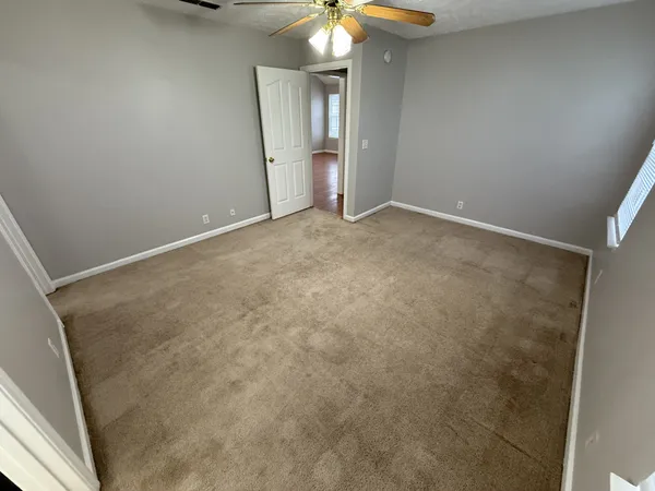 a view of an empty room and window