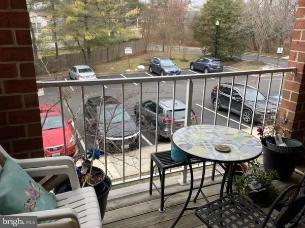 a view of a chairs and table in the patio