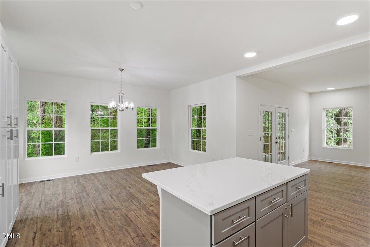 1408 South Street Durham, NC 27707 - Photo 22 of 37 wooden floor in an empty room with a window