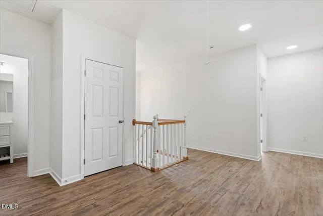 a view of a livingroom with wooden floor
