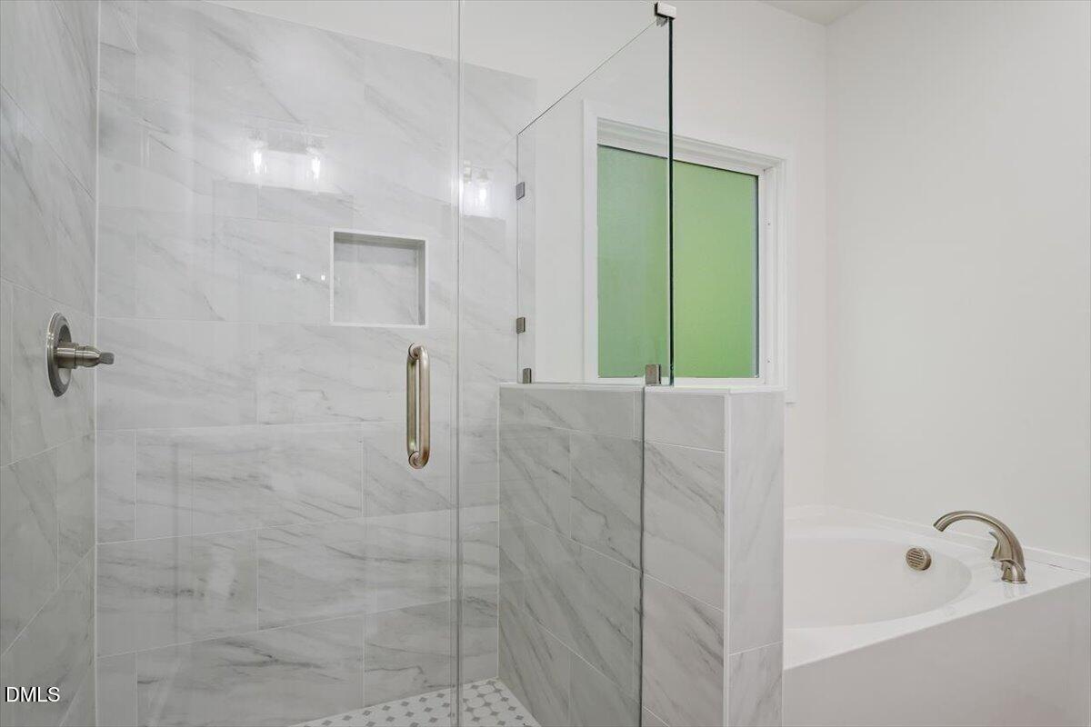 1408 South Street Durham, NC 27707 - Photo 36 of 37 a bathroom with a shower