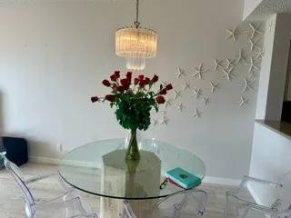 a vase of flowers sitting on a table