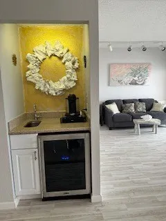 a living room with a fireplace and a flat screen tv