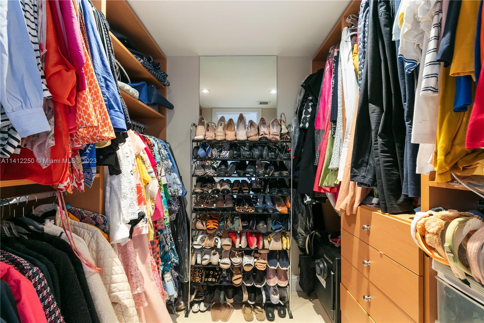 2333 Brickell Avenue, Unit 1511 Miami, FL 33129 - Photo 27 of 59 a view of walk in closet with clothes and shoes