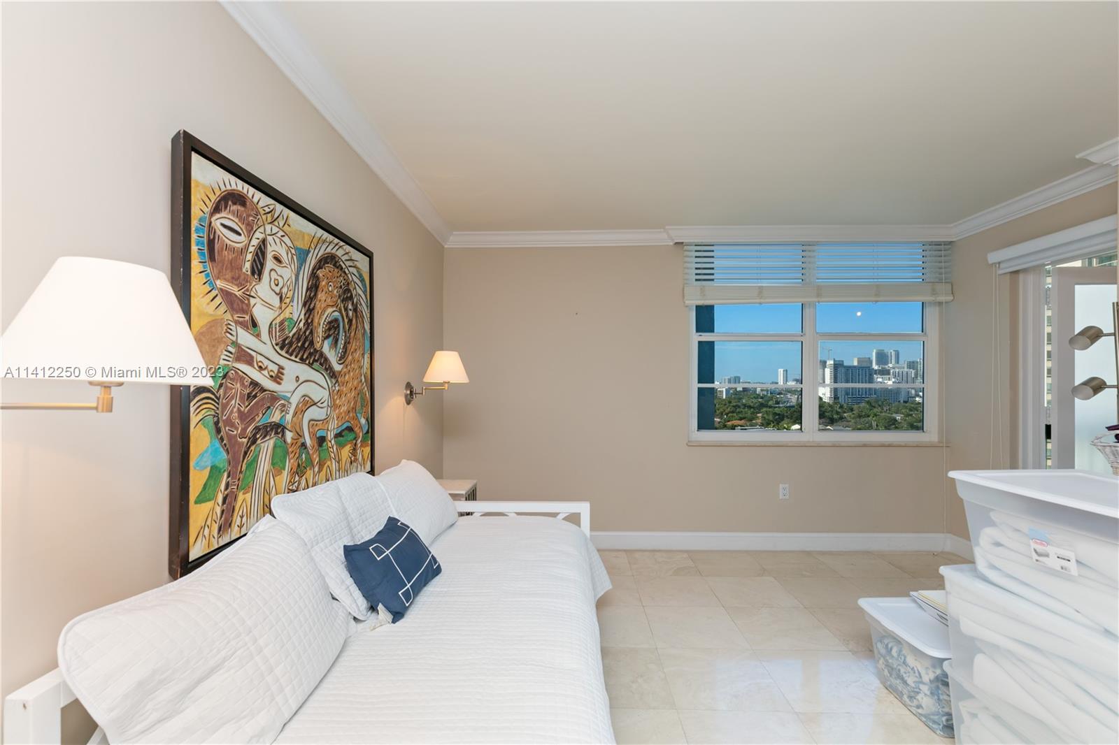 2333 Brickell Avenue, Unit 1511 Miami, FL 33129 - Photo 31 of 59 a living room with furniture and a window