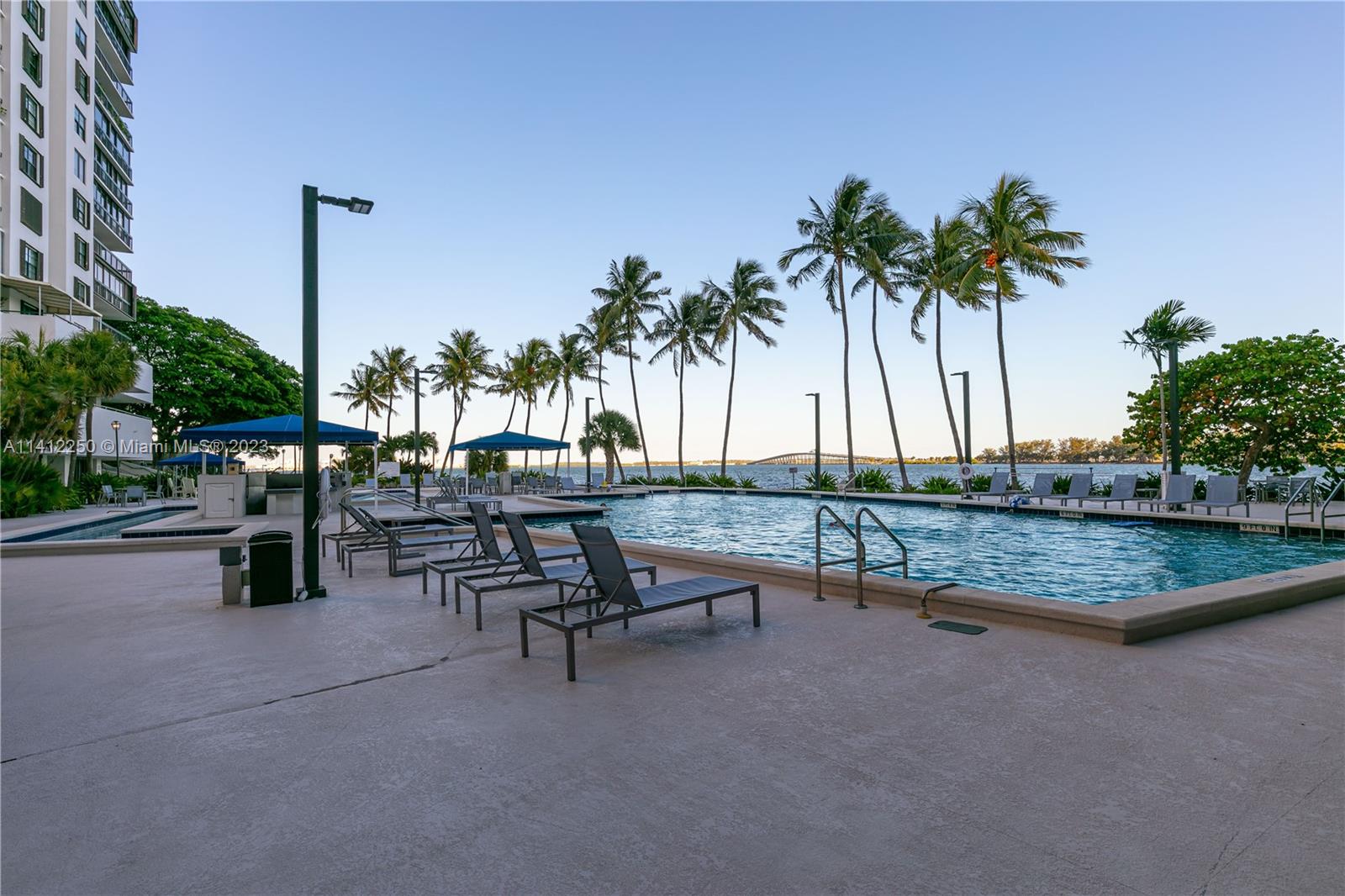 2333 Brickell Avenue, Unit 1511 Miami, FL 33129 - Photo 53 of 59 a view of a swimming pool with chairs
