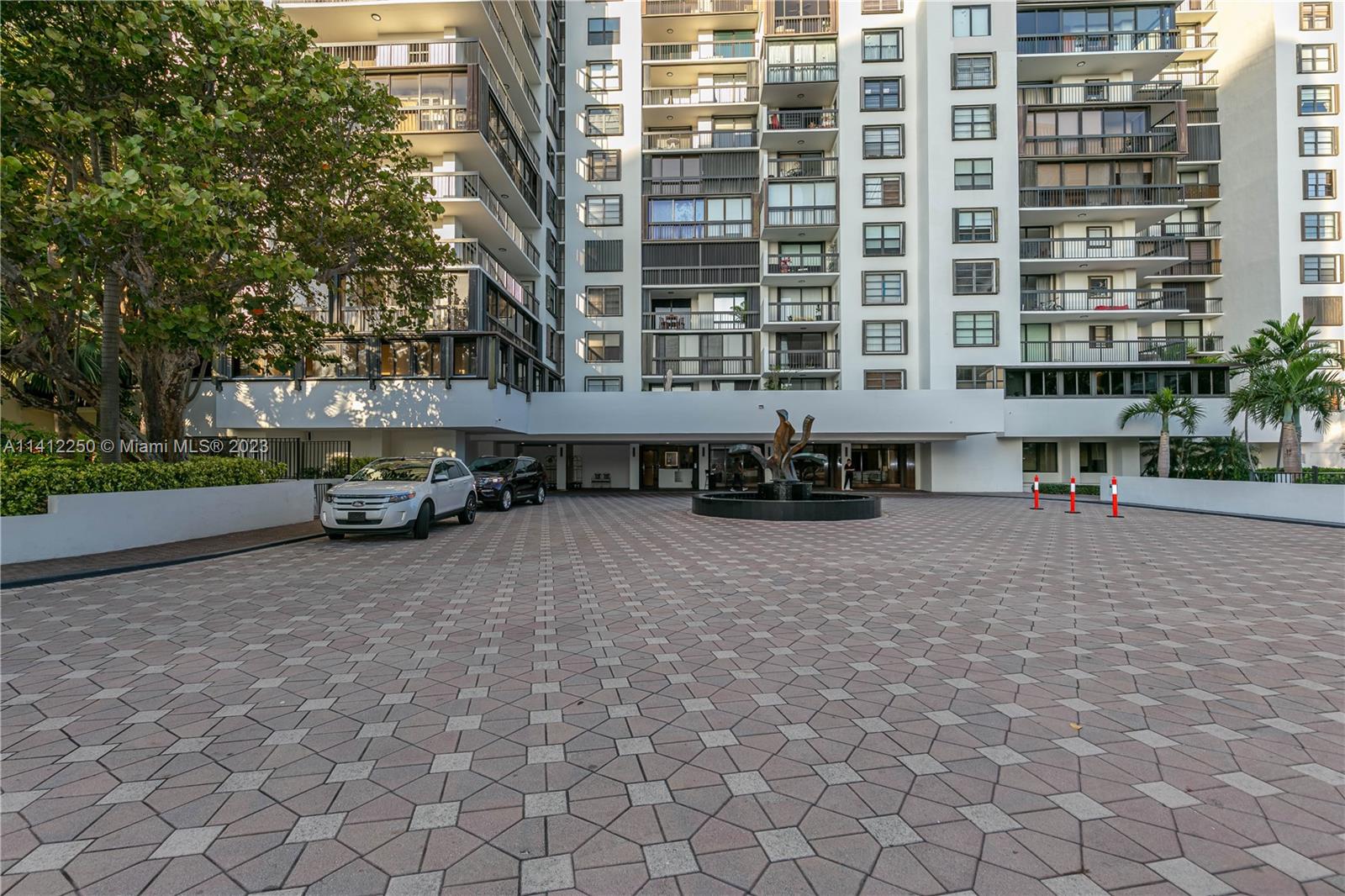 2333 Brickell Avenue, Unit 1511 Miami, FL 33129 - Photo 56 of 59 a car parked in front of a building