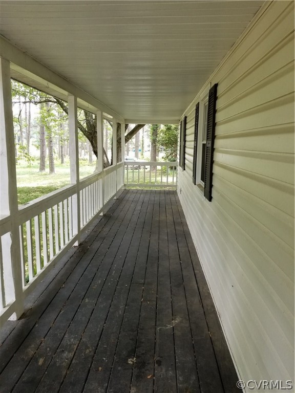 10409 Hickory Road Petersburg, VA 23803 - Photo 2 of 3 a view of wooden floor in a balcony