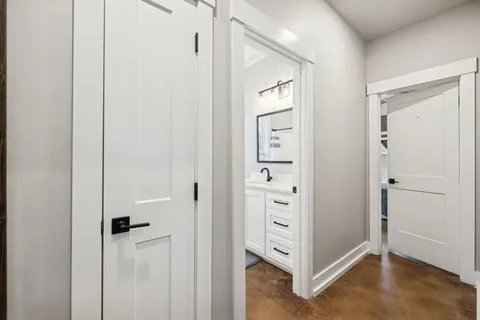 a bathroom with a tub and a shower