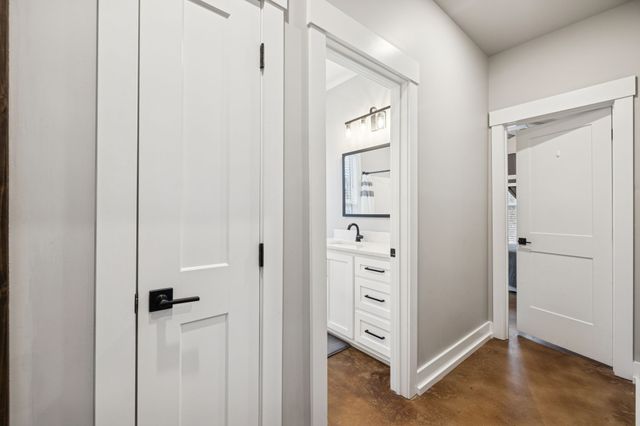 a bathroom with a tub and a shower