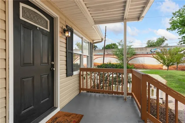 a view of a porch with a yard