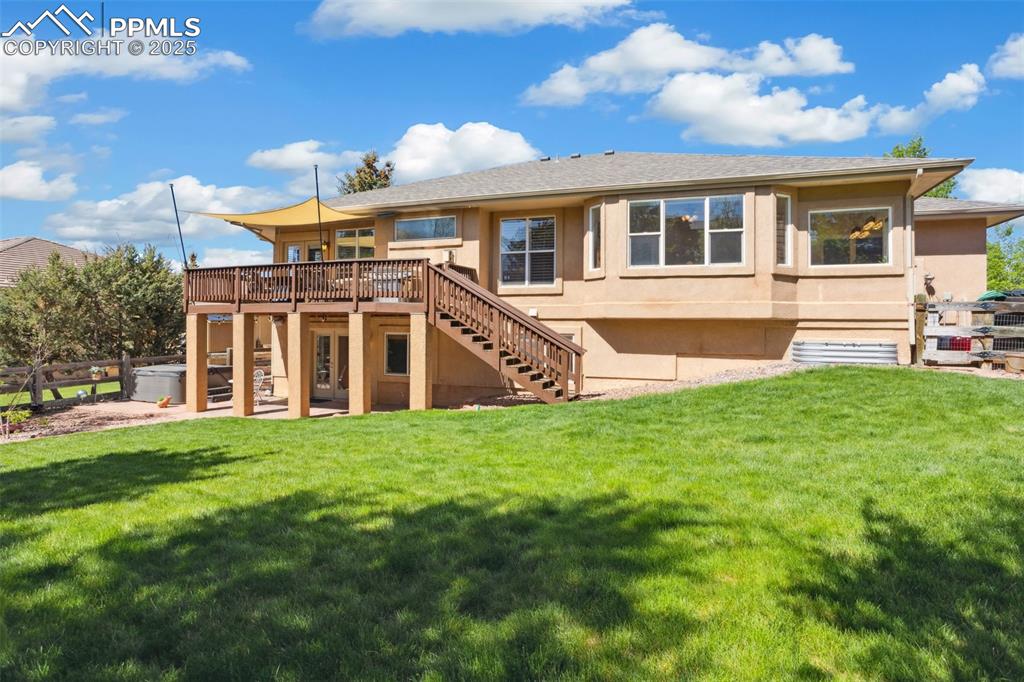 16243 Kitchener Way Monument, CO 80132 - Photo 29 of 33 a front view of a house with a yard