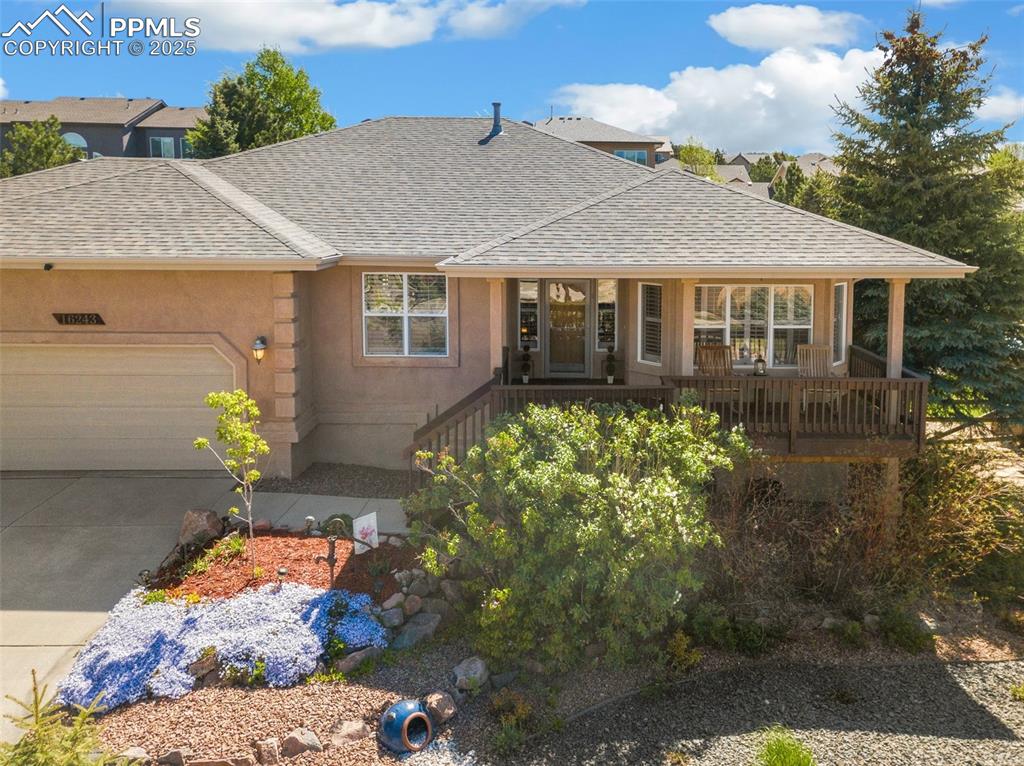 16243 Kitchener Way Monument, CO 80132 - Photo 31 of 33 a front view of a house with a yard