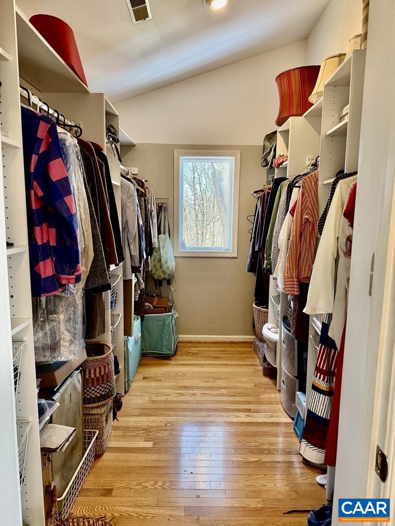 821 Gilliams Mountain Road Charlottesville, VA 22903 - Photo 22 of 40 a view of walk in closet with clothes and shoes