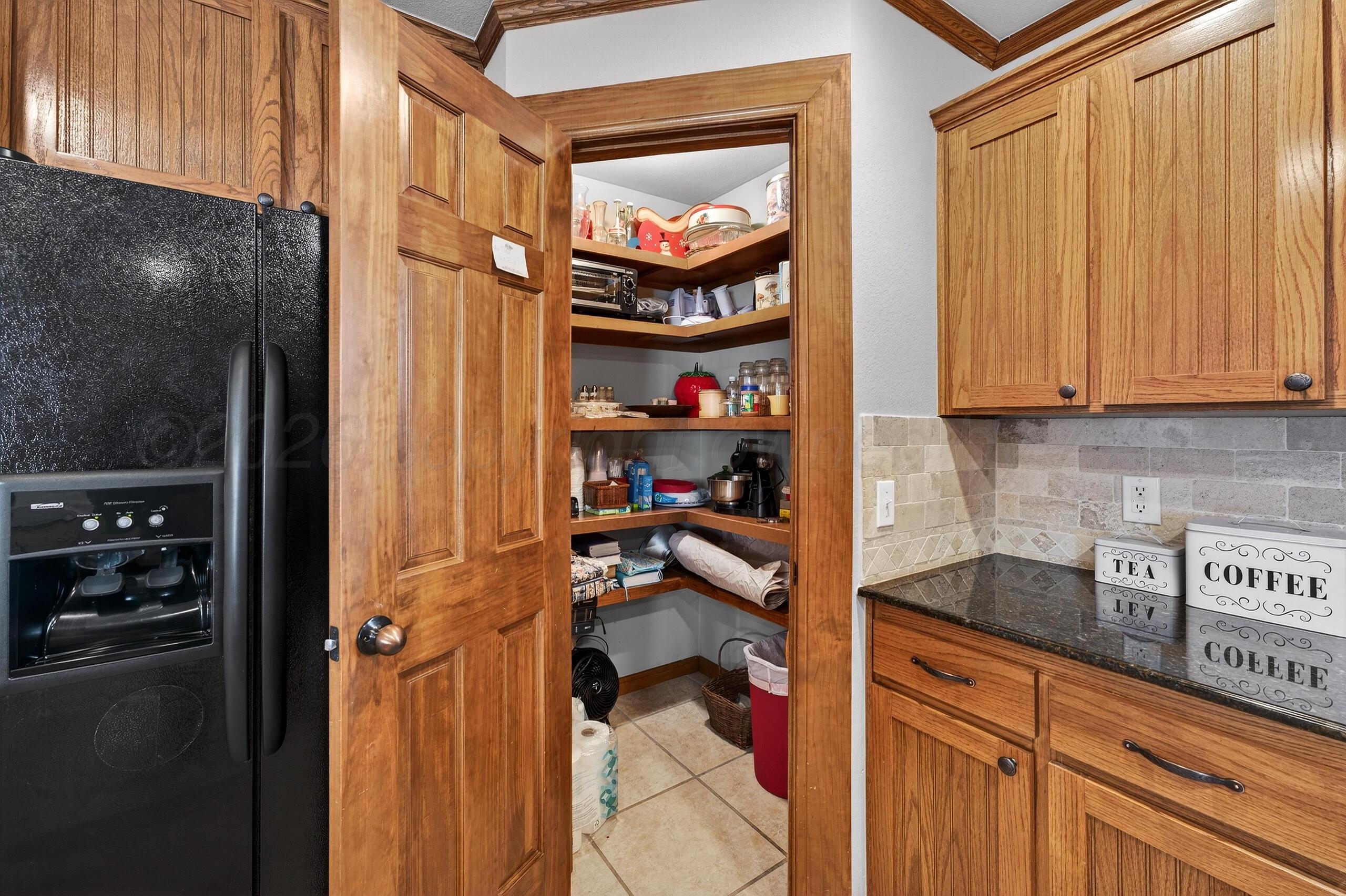 312 Dysart Street Claude, TX 79019 - Photo 14 of 37 a view of a kitchen storage and a sink