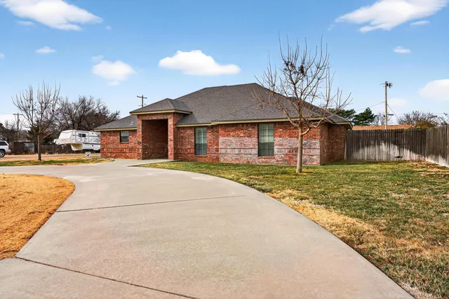 a house view with a garden space