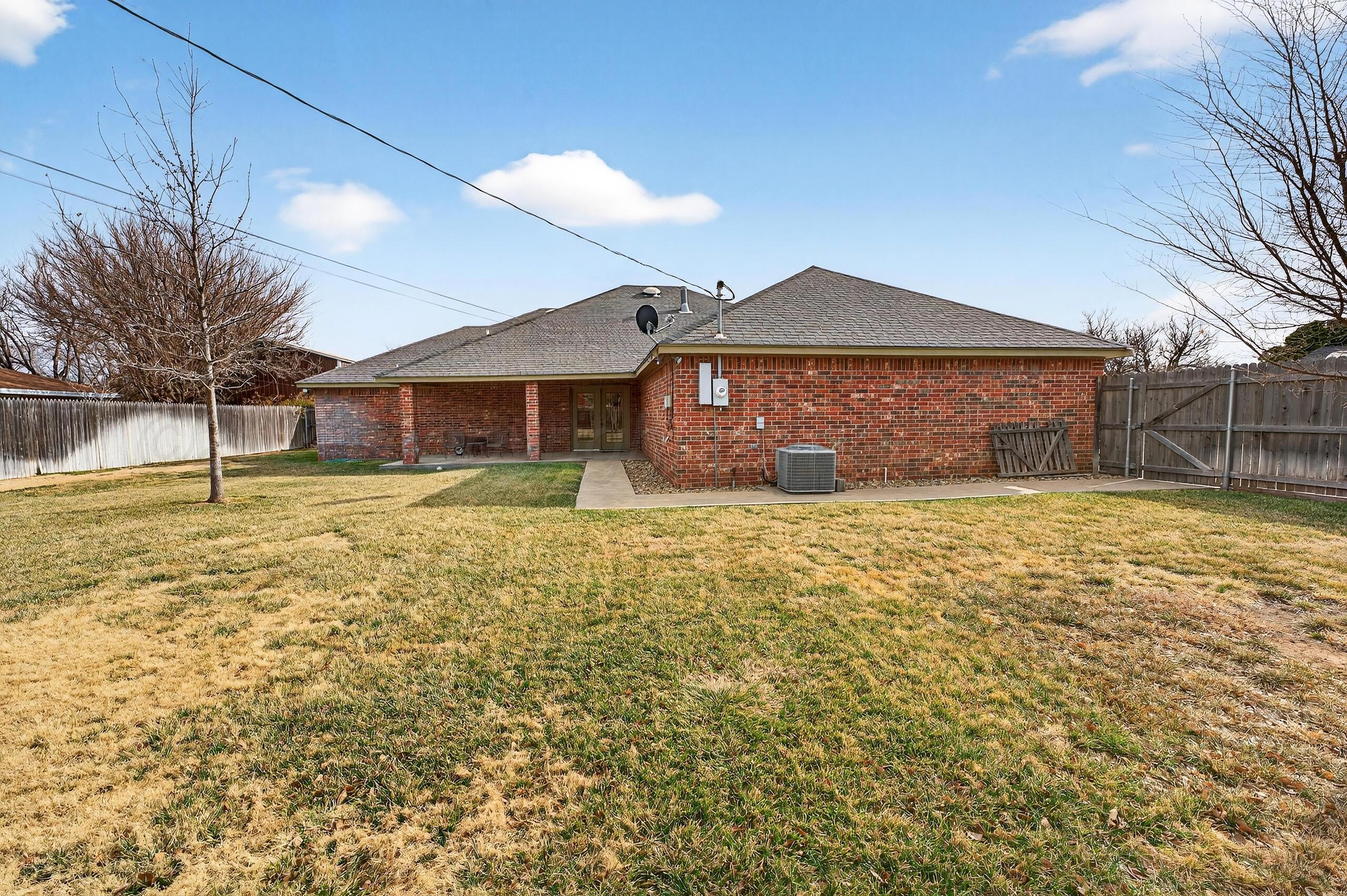 312 Dysart Street Claude, TX 79019 - Photo 35 of 37 a front view of a house with a yard
