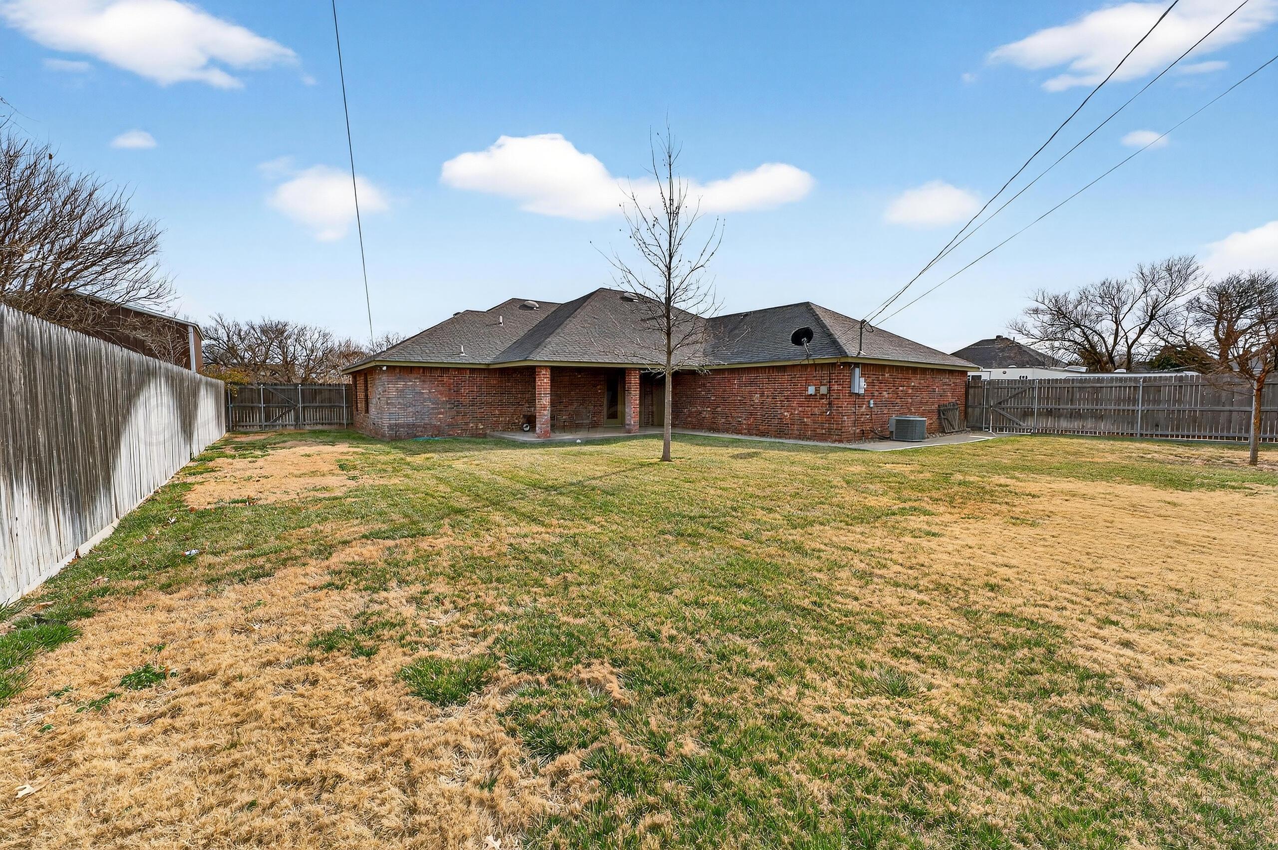 312 Dysart Street Claude, TX 79019 - Photo 37 of 37 a view of a house with a yard