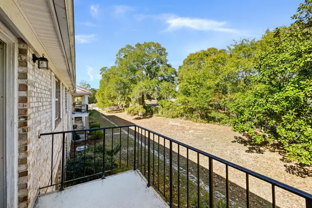 a view of a balcony with an outdoor space
