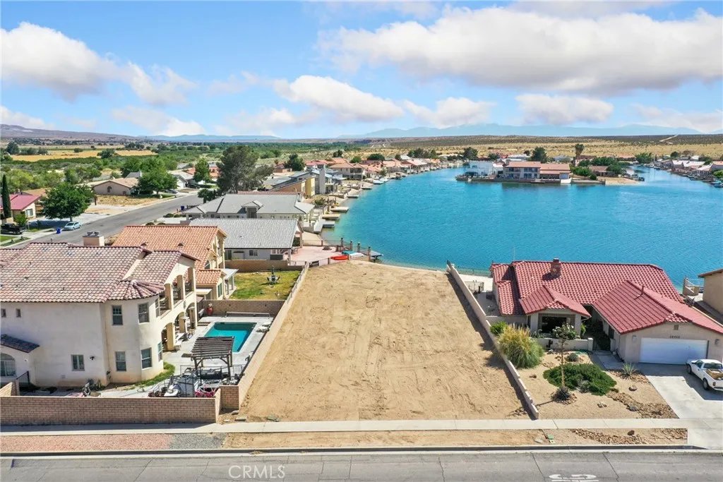 0 Bluewater Road Helendale, CA 92342 - Photo 6 of 9 an aerial view of a house with a garden and lake view