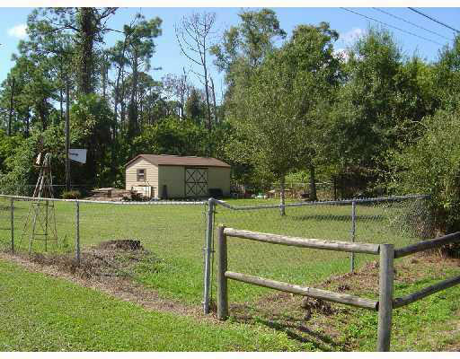731 South Jenkins Road Fort Pierce, FL 34947 - Photo 3 of 11 Storage Shed