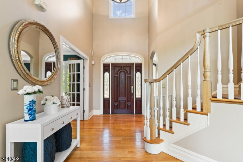 99 East Lindsley Road Cedar Grove, NJ 07009 - Photo 2 of 41 a view of living room with furniture and a mirror