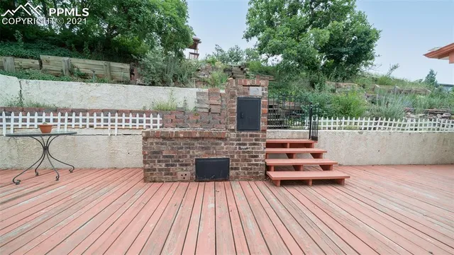swimming pool view with a seating space