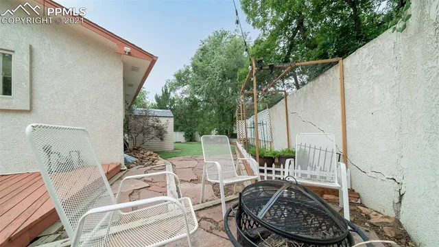 an aerial view of a houses with outdoor space